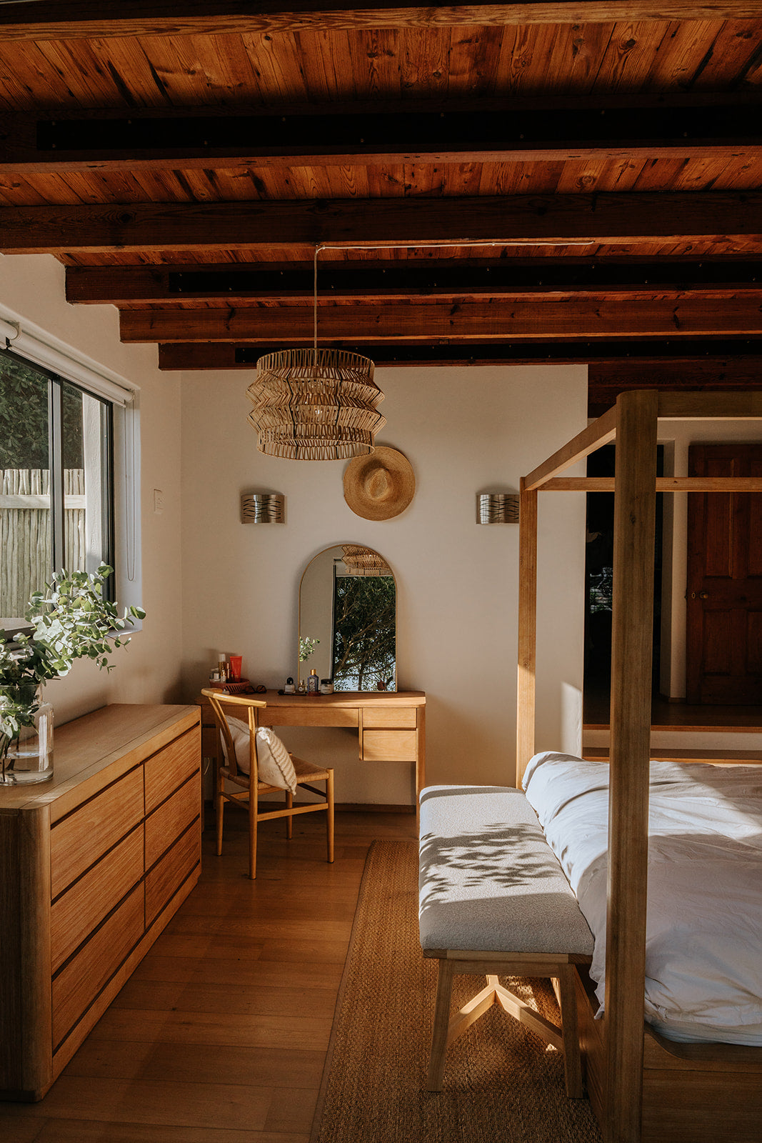 The Safari pendant on display in a rustic, safari themed bedroom