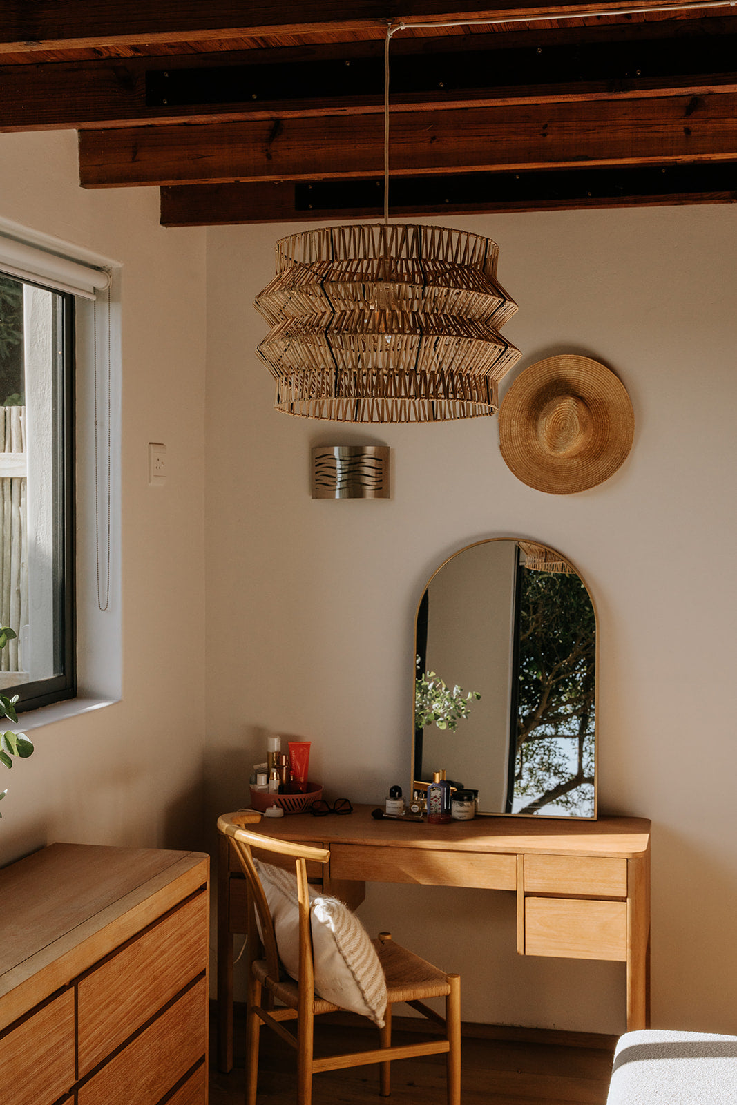 The Safari pendant on display in a rustic, safari themed bedroom
