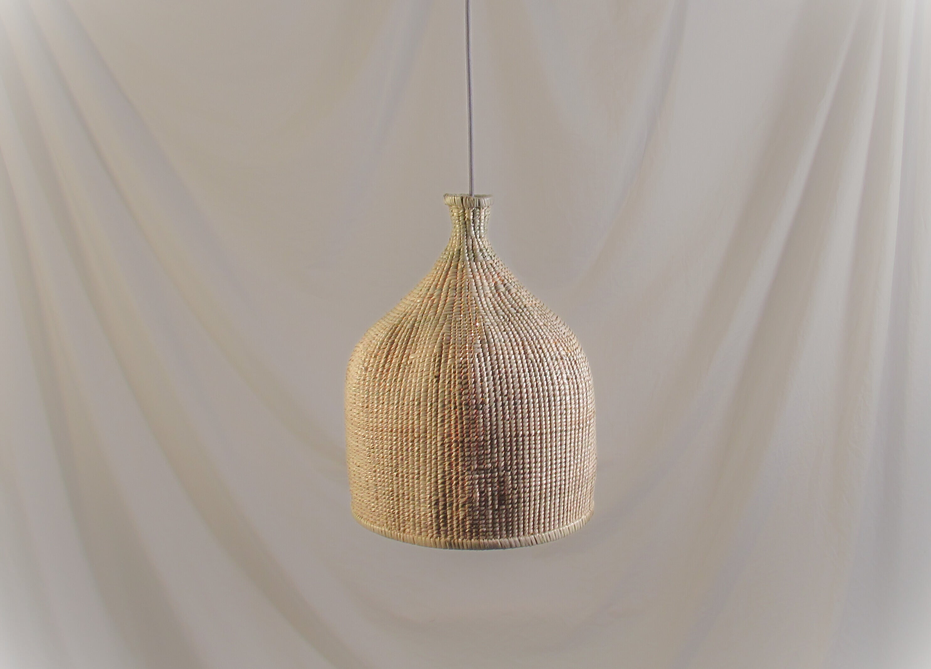 Kitchen hanging light hotel restaurant lodge safari interior design unique lighting cozy unique dense weave