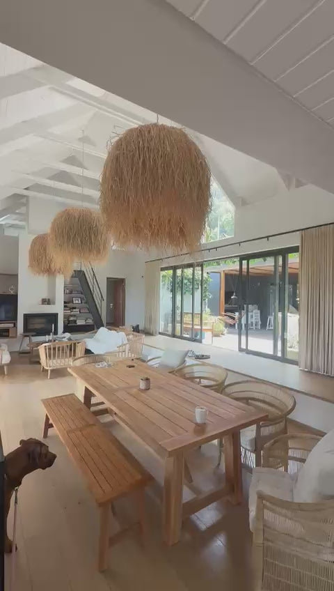 Bush Baby Dome Raffia Pendants on display in a modern home