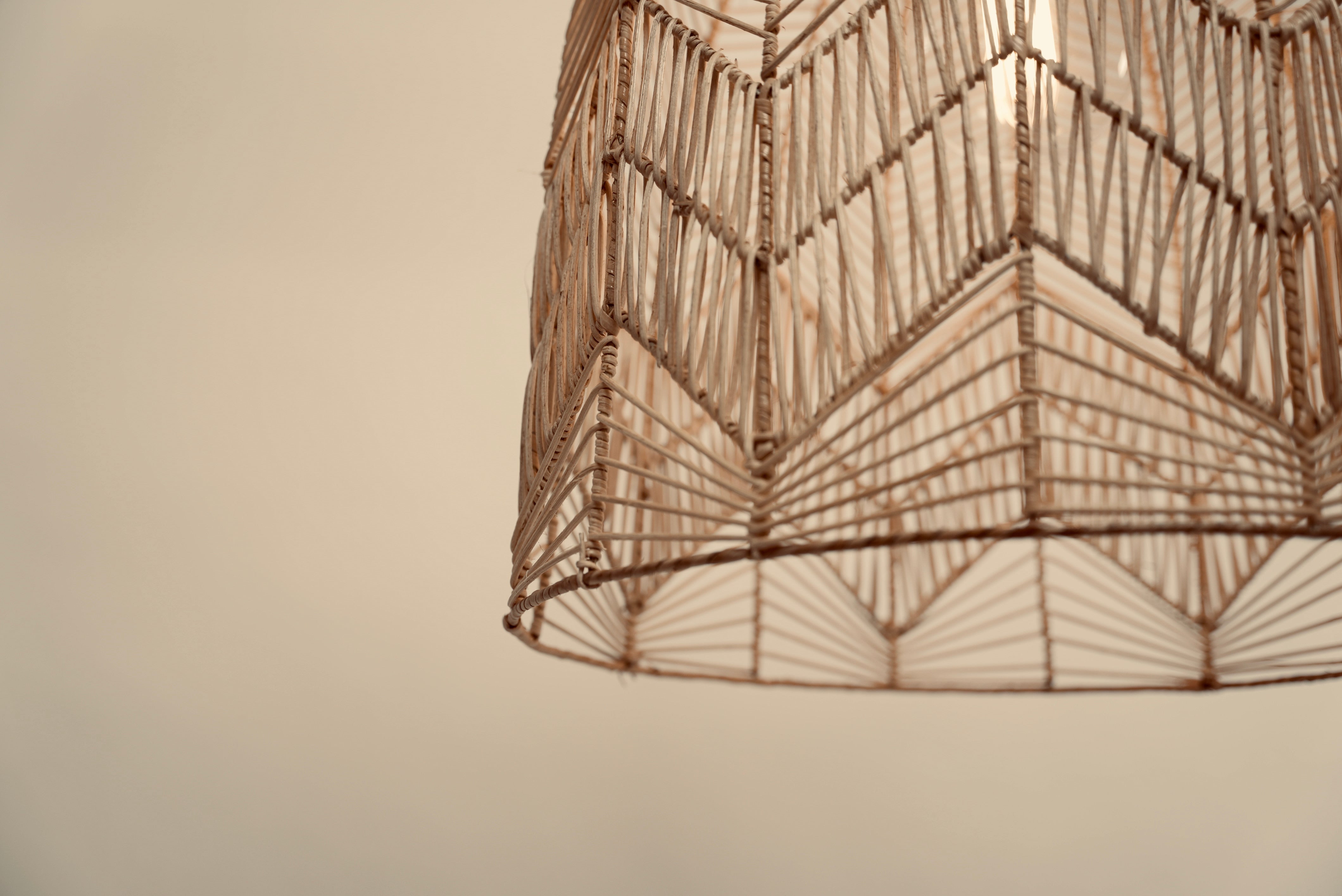 A close-up of the Circus pendant photographed against a neutral background