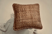 The crispy woven cushion photographed to showcase the intricate weaving pattern