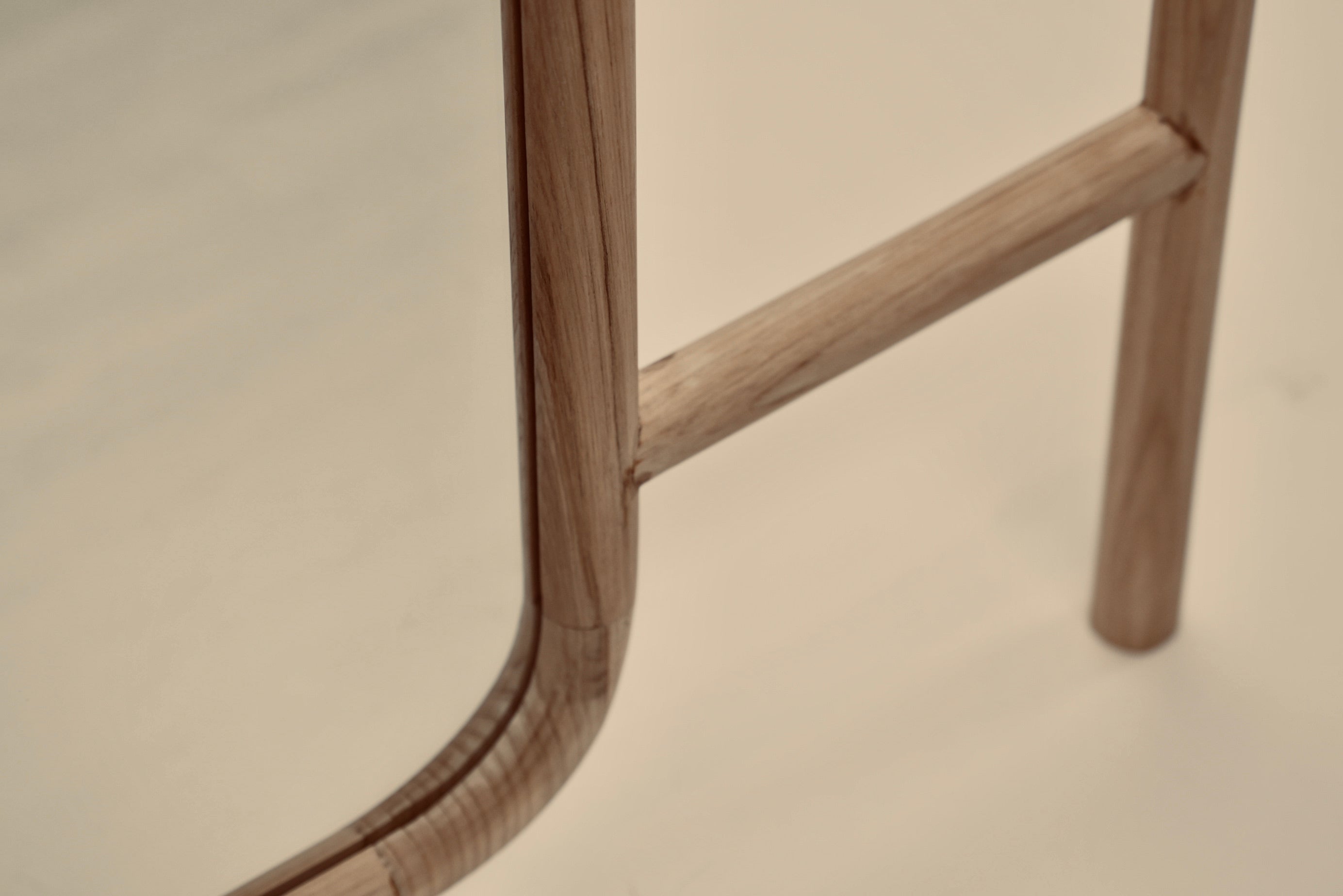 A close-up of the Muji mirror photographed against a neutral background