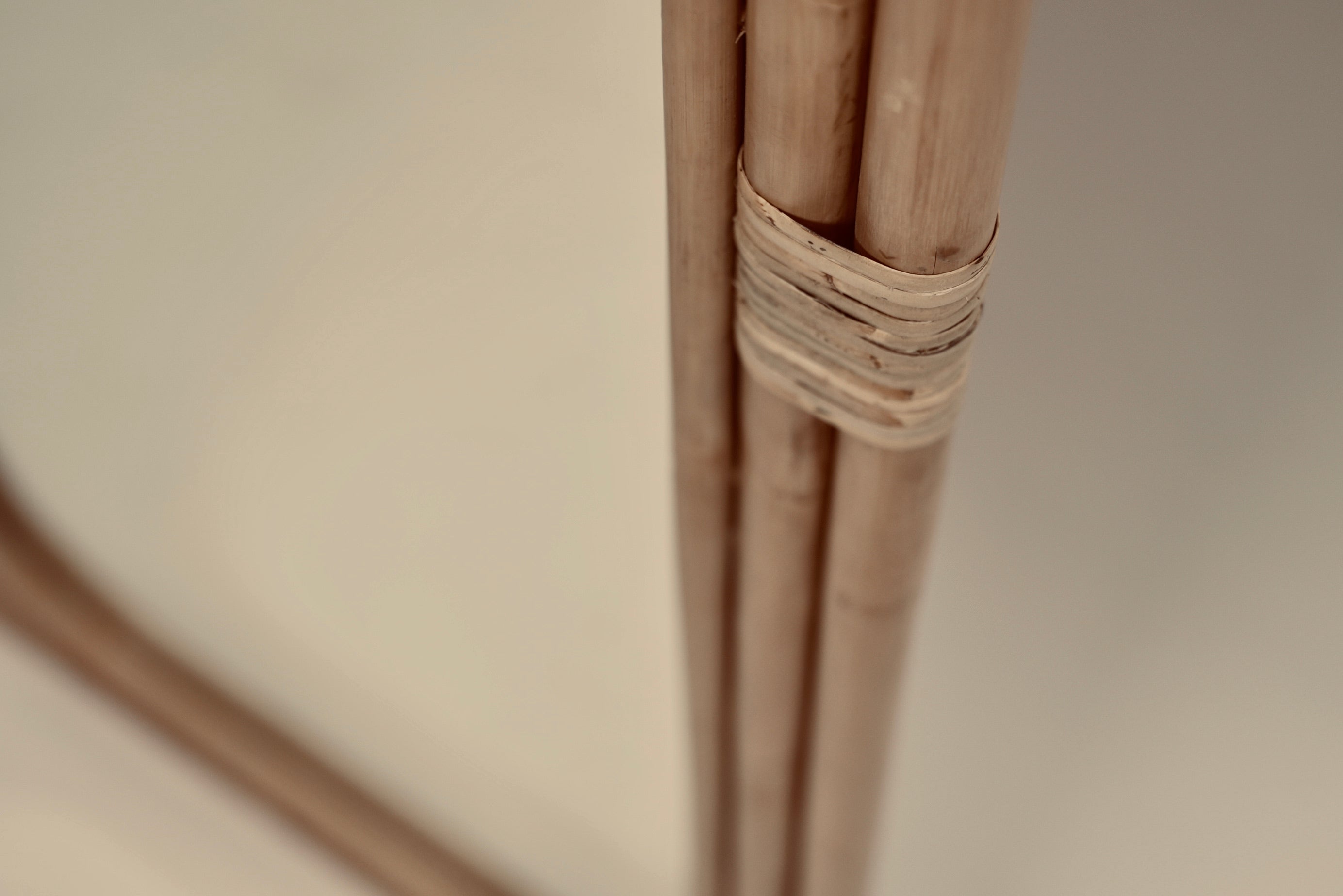A close-up of the Ibu mirror photographed against a neutral background