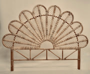The Rattan Ibu headboard photographed against a neutral headboard
