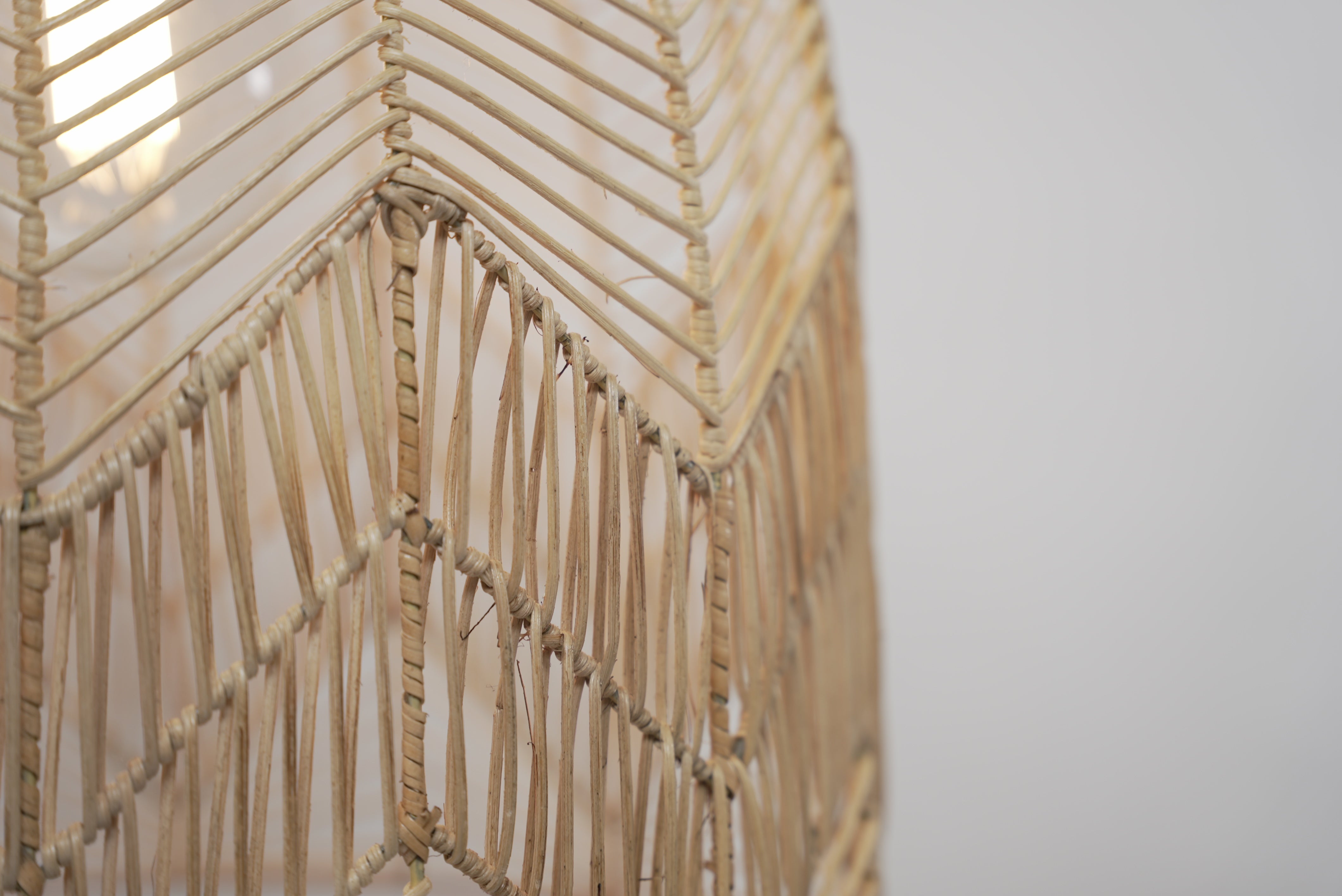 A close-up of the Circus pendant photographed against a neutral background