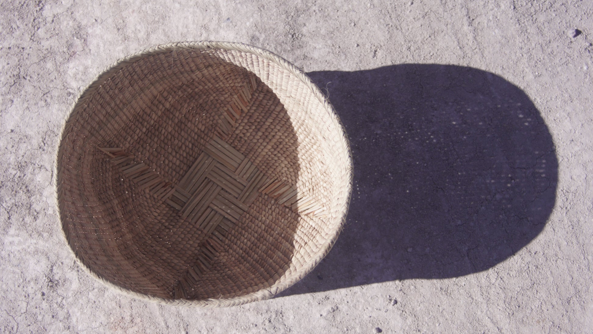 Ilala wonky basket photgraphed from top and shows cross shaped woven pattern