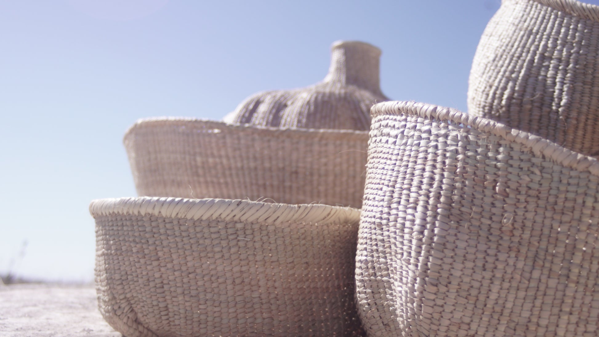 A bunch of Ilala wonky baskets photgraphed outside
